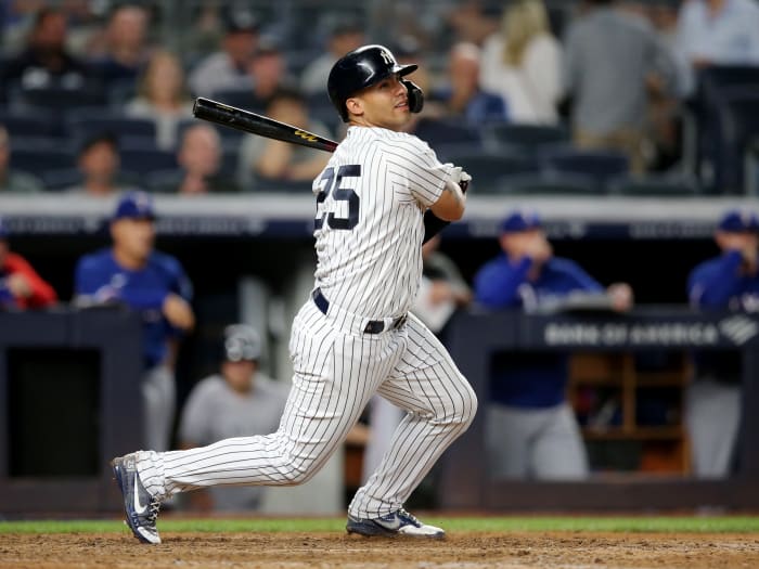 Sep 22, 2021; Bronx, New York, USA; New York Yankees second baseman Gleyber Torres (25) follows through on an RBI double against the Texas Rangers during the eighth inning at Yankee Stadium.